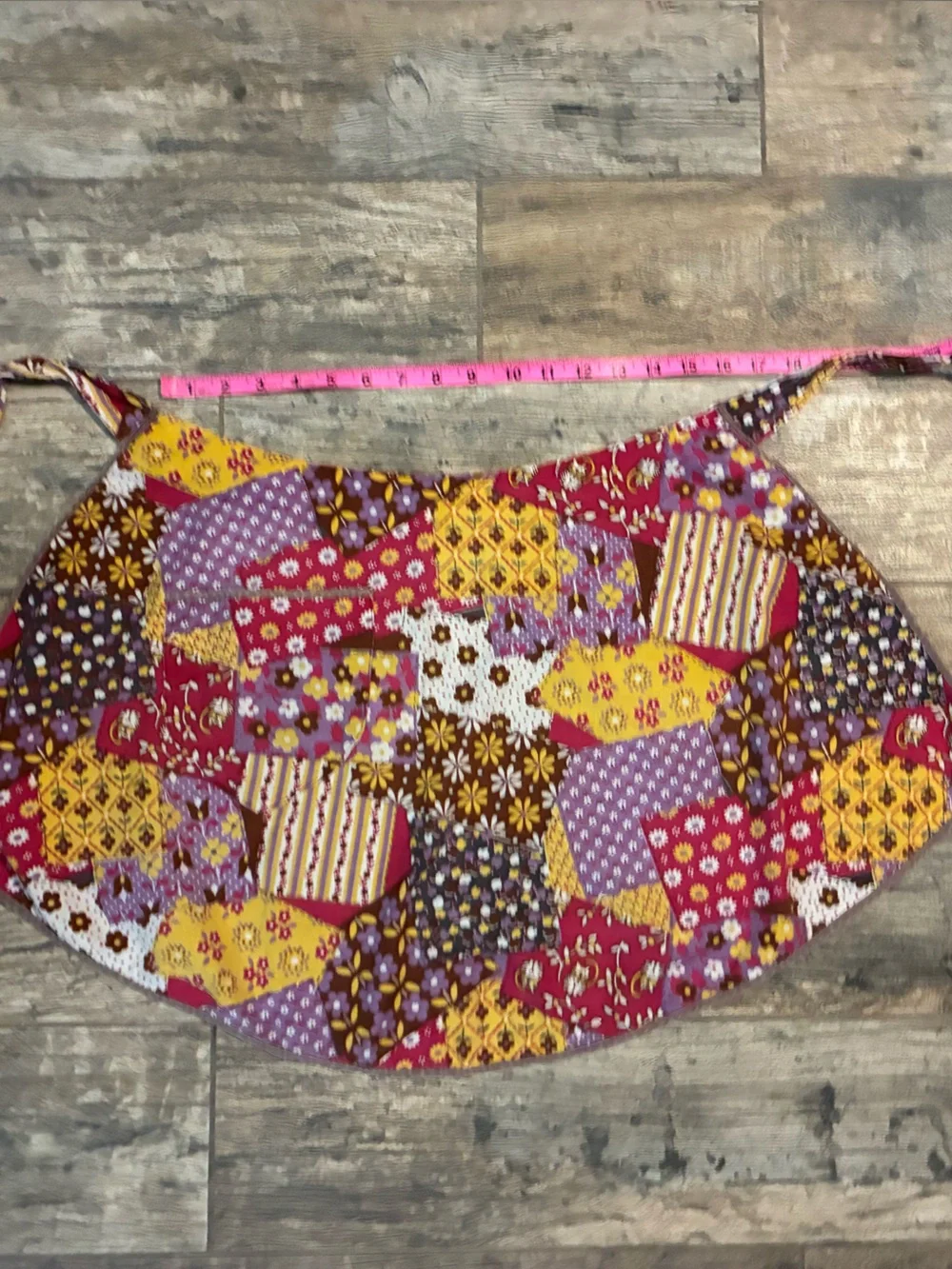 The handmade patchwork purple pink apron